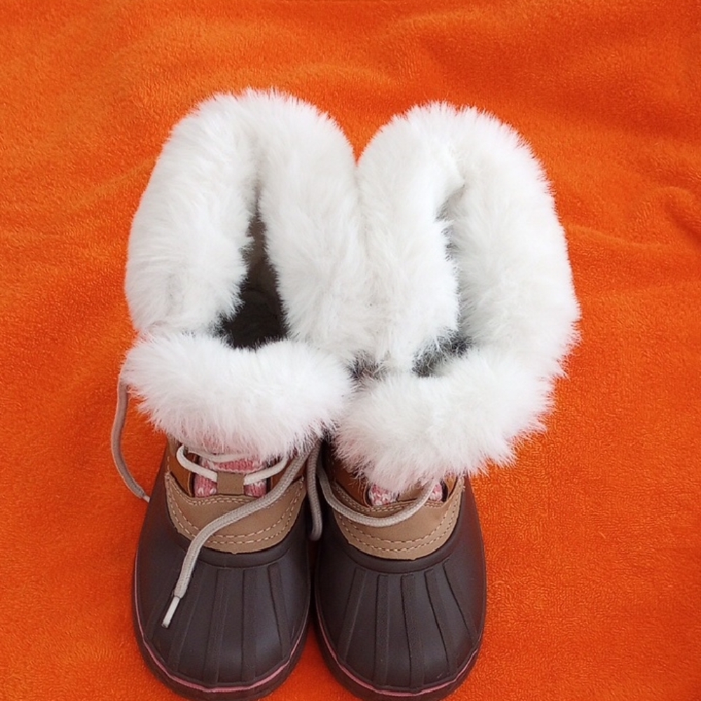 Brown with pink and white colored pair of  boots